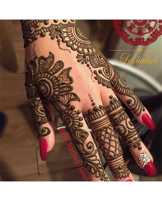 Weave And Floral Elegant Back Hand Mehndi Design Style